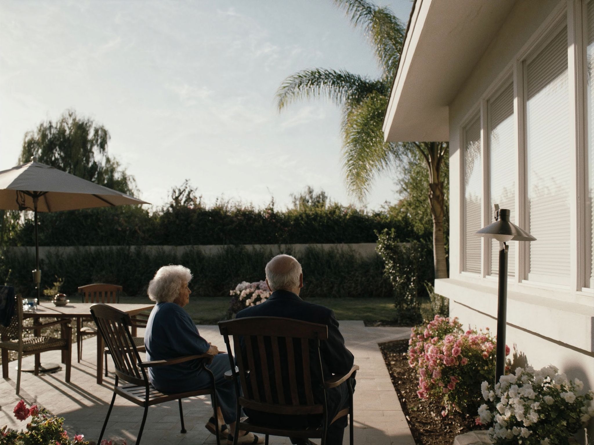 A sunlit garden patio of a residential care home